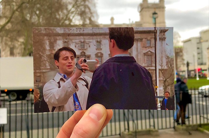 A scene snippet of Joey and Chandler from Friends aligned with a historic London building.
