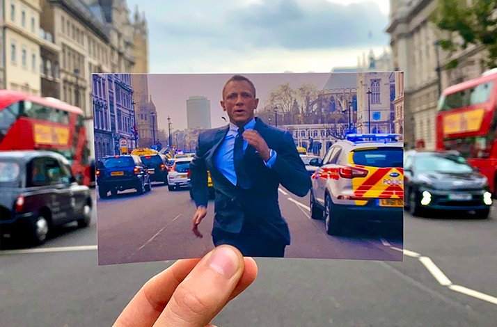 A snippet of James Bond in Skyfall aligned with a busy Whitehall street in London.