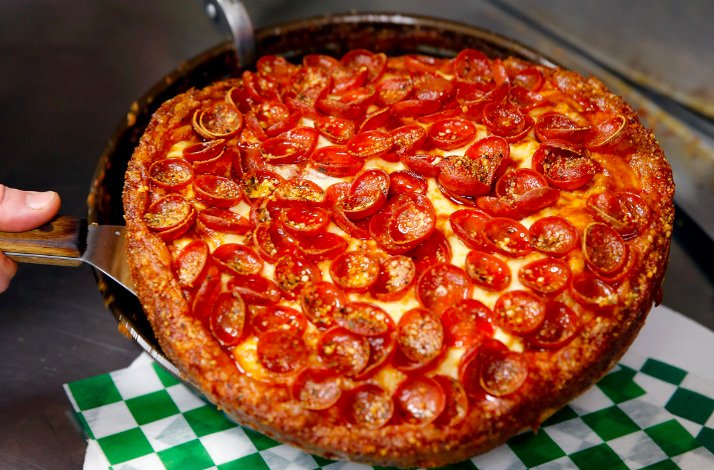 Cracker-crisp Chicago tavern-style pepperoni pizza with peppers.