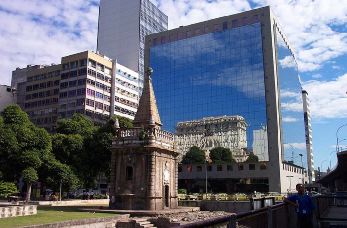 Historic Praça XV landmark surrounded by Rio de Janeiro's downtown architecture.