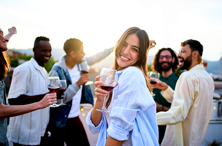 Guests gathering around a shared table during an authentic Argentine asado experience.