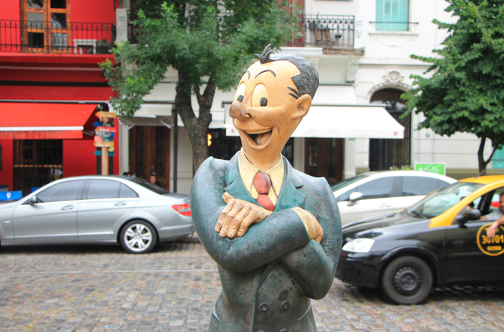 Iconic comic character sculpture along the Paseo de la Historieta in Buenos Aires.