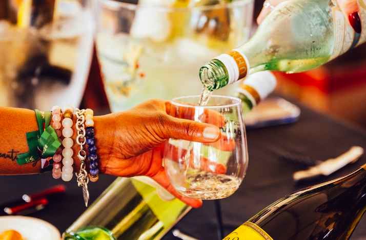 Close-up of a festive, vibrant wine-tasting pour.
