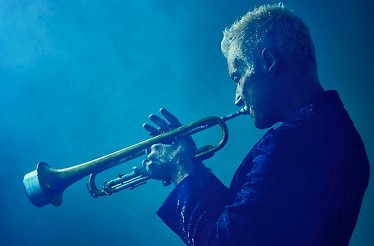 American Grammy-winning jazz trumpeter and composer Chris Botti performing on stage.