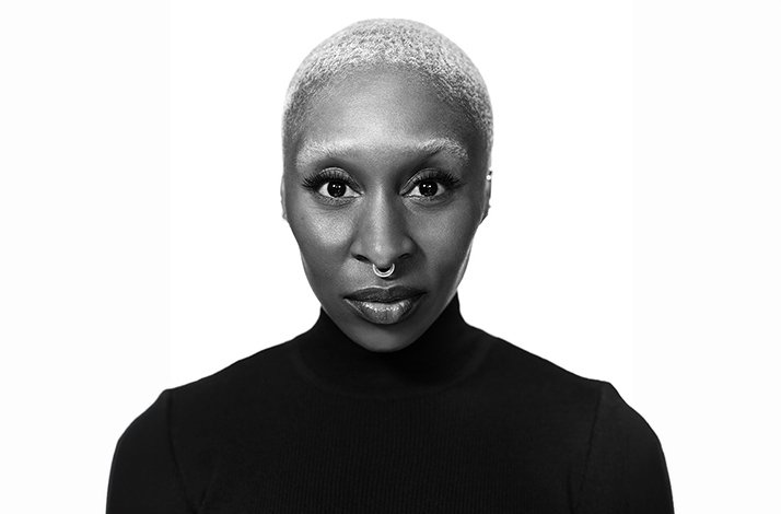 A black and white portrait of Cynthia Erivo.