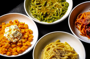 An assortment of coloured pasta dishes served at Luca Osteria.