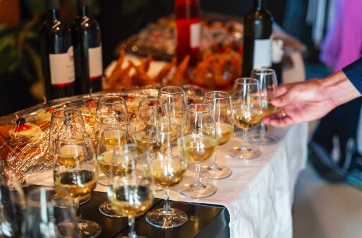 Wine glasses lined up for a tasting event at the Michelin-recommended restaurant within Hotel Vila Rova, Croatia.